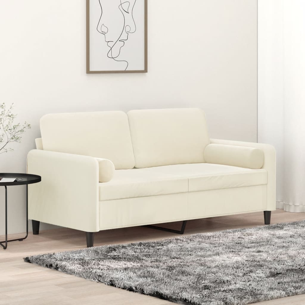 2-personers sofa med pyntepuder 140 cm velour cremefarvet